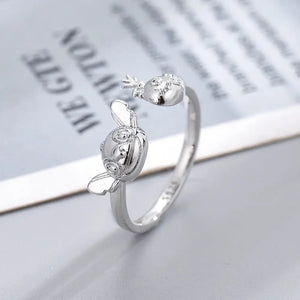 Bague ouverte couleur argent , à l'effigie de Stitch et Souillon